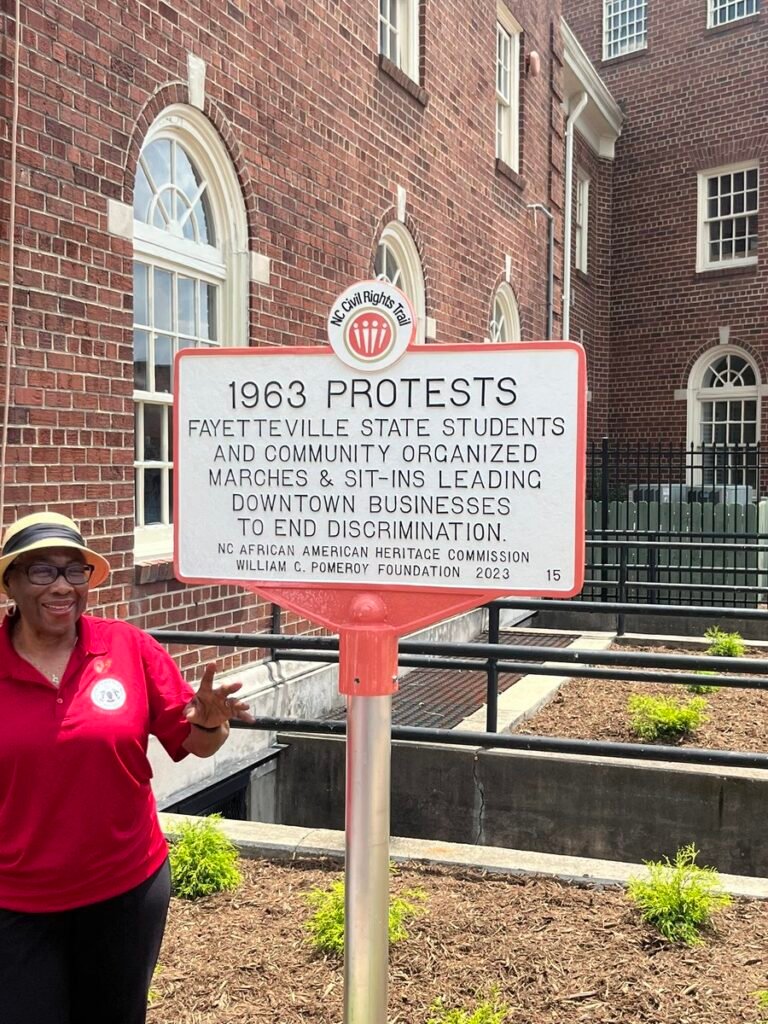 JoAnn Adams at NC Civil Rights Trail Ceremony_Standing in Front of Civil Rights Marker_Courtesy of Rep Charles Smith