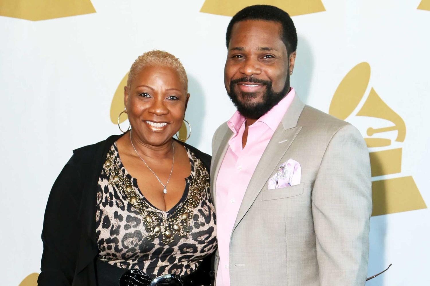 Malcolm-Jamal Warner's Widow Says She Didn't Want to Sue His Mother ...