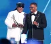 Stevie Wonder presents Jamie Foxx with the BET Ultimate Icon Award; Photo Credit: Getty Images