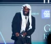 Kendrick Lamar beaming with joy as he receives the Album of the Year award at the 2025 BET Awards; Photo Credit: Getty Images